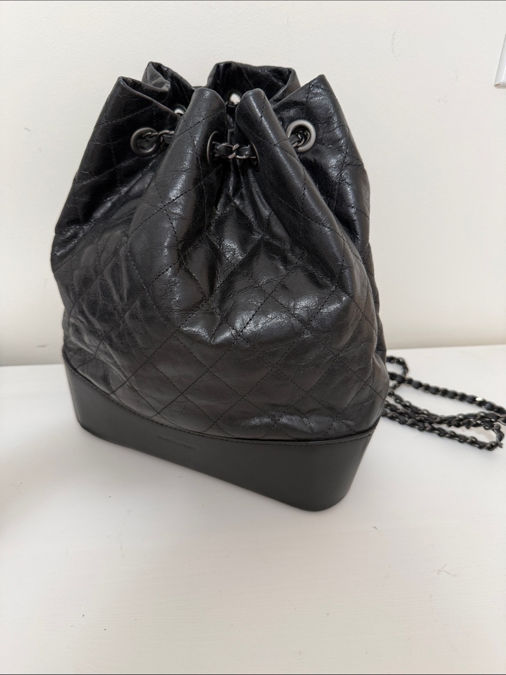 Woman leather chain backpack